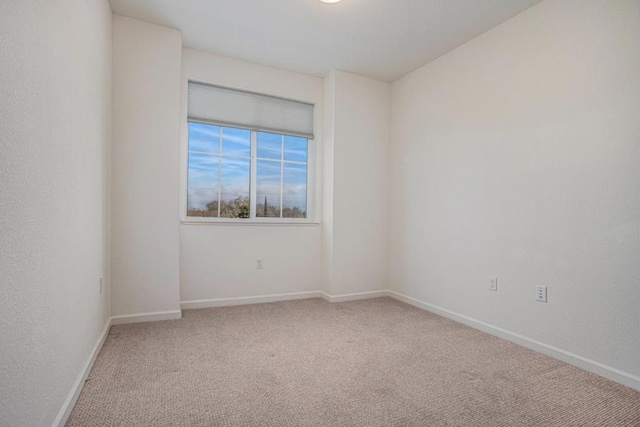 unfurnished room with carpet