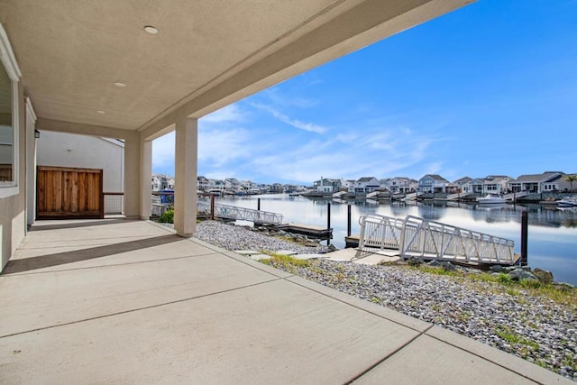 view of patio / terrace with a water view