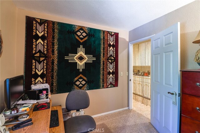 office area featuring a textured ceiling