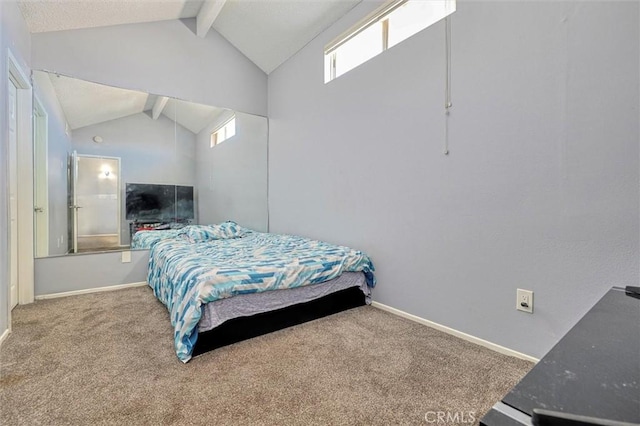 carpeted bedroom with lofted ceiling with beams and baseboards