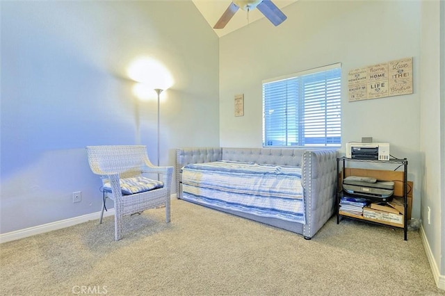 bedroom featuring ceiling fan, baseboards, carpet floors, and high vaulted ceiling