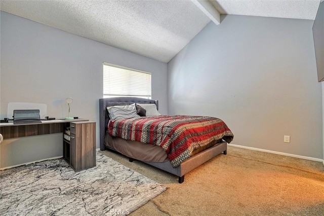 bedroom featuring vaulted ceiling with beams, light colored carpet, baseboards, and a textured ceiling