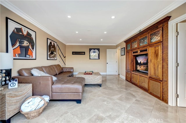 living room with a fireplace and crown molding