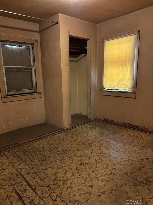 unfurnished bedroom featuring a closet