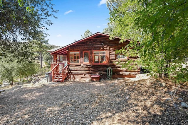 view of log home