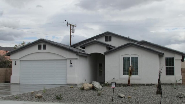 view of front of home with a garage