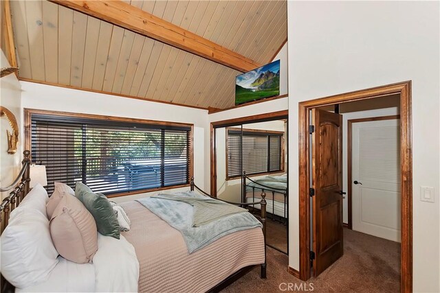 bedroom featuring wooden ceiling, carpet flooring, lofted ceiling with beams, and a closet