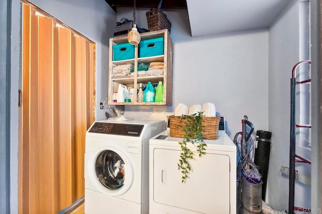 laundry room with washing machine and dryer