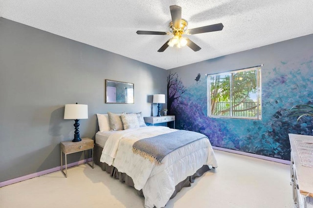 carpeted bedroom with a textured ceiling and ceiling fan