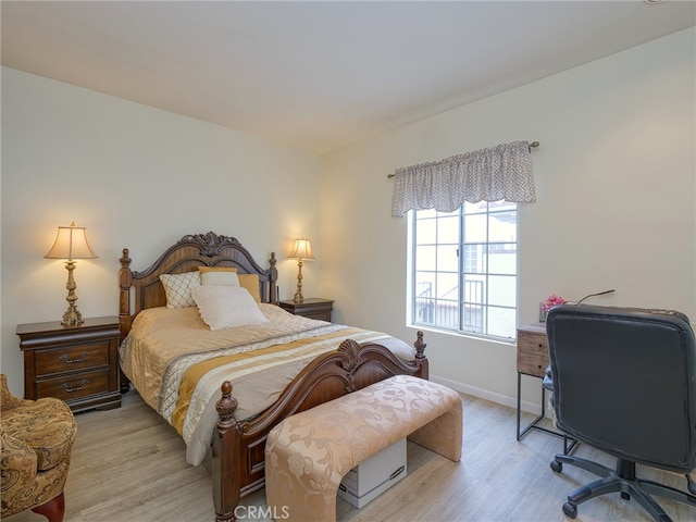 bedroom featuring light wood-type flooring