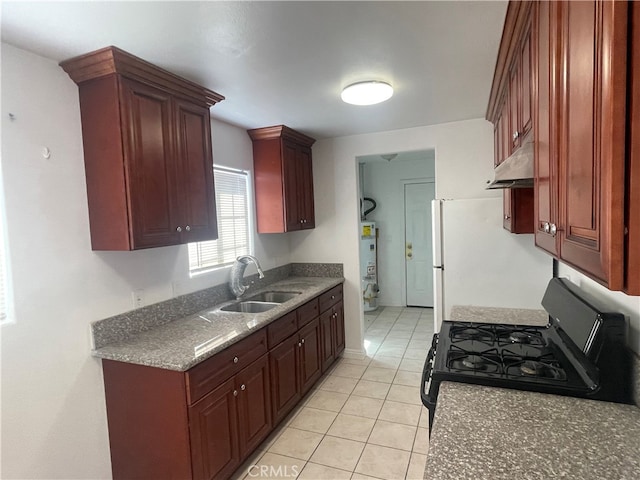 kitchen featuring gas water heater, black gas range oven, light tile patterned flooring, and sink