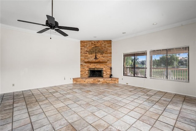 unfurnished living room with a stone fireplace, ceiling fan, and crown molding