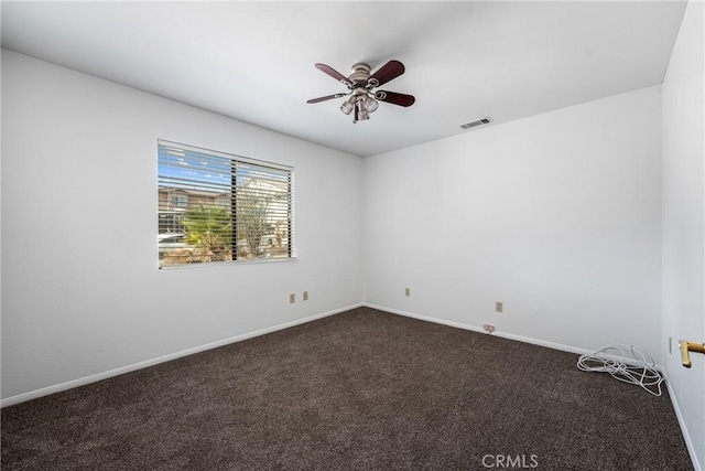 carpeted empty room with ceiling fan