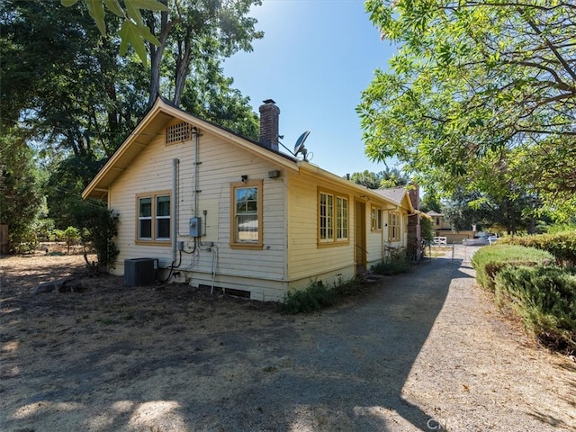 view of property exterior with central AC unit