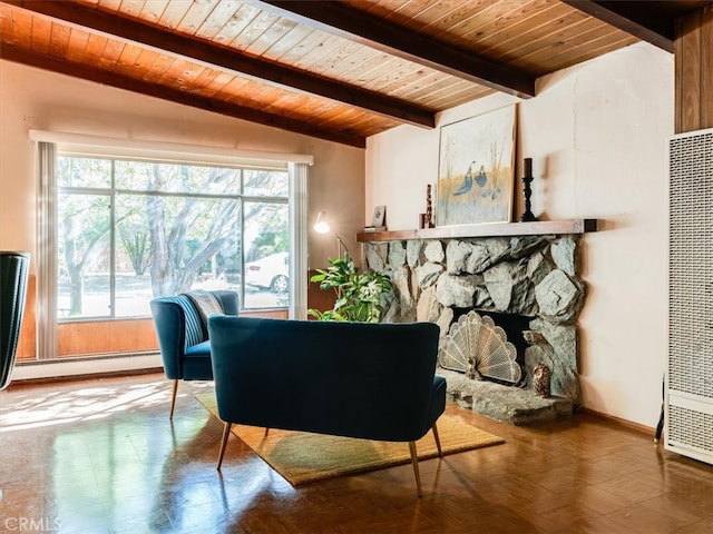 sitting room with wood ceiling, parquet floors, a baseboard heating unit, lofted ceiling with beams, and a fireplace