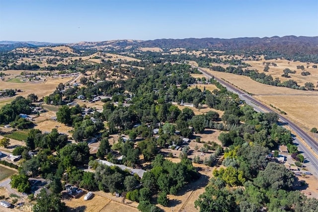 bird's eye view with a mountain view and a rural view