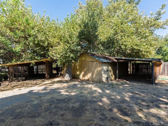 exterior space featuring a carport