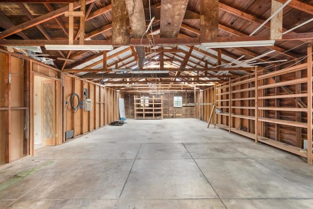 miscellaneous room featuring lofted ceiling