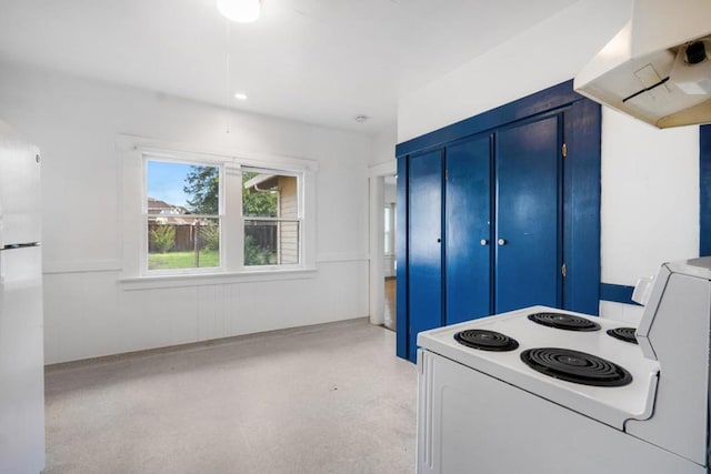 kitchen featuring white electric range and extractor fan