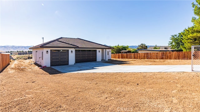 garage featuring a mountain view