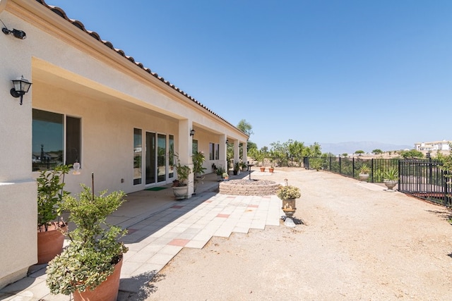 view of patio / terrace featuring a mountain view