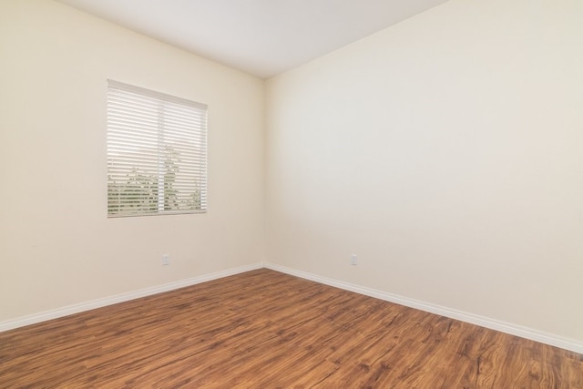 empty room featuring hardwood / wood-style floors