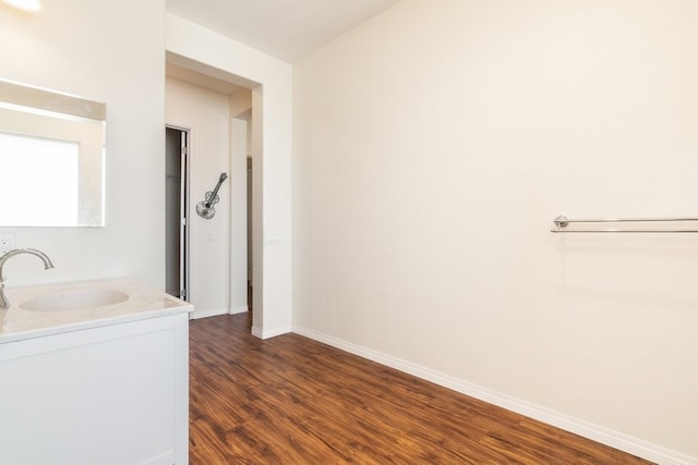 bathroom featuring vanity and hardwood / wood-style floors