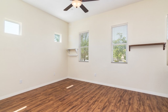 unfurnished room with ceiling fan and hardwood / wood-style flooring