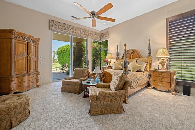 bedroom with ceiling fan, light carpet, access to outside, and multiple windows