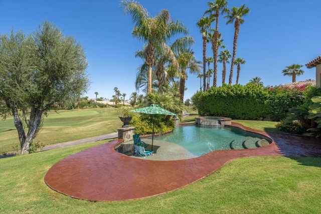 view of swimming pool featuring a lawn and an in ground hot tub