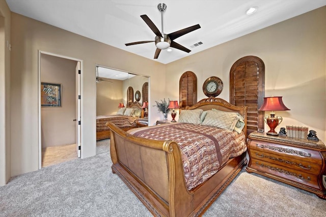 carpeted bedroom featuring ceiling fan