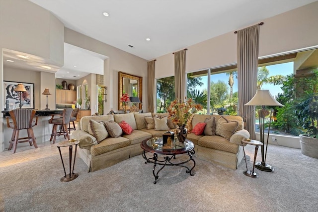 living room featuring light carpet