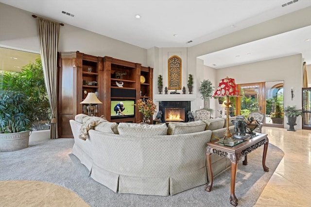 tiled living room featuring a fireplace