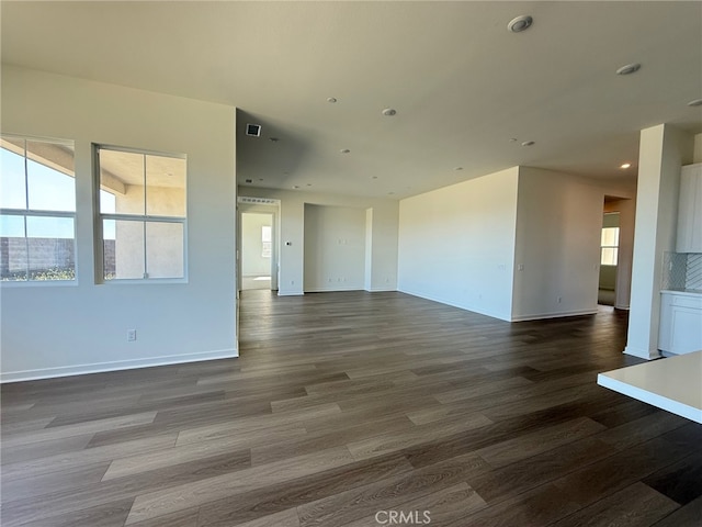 15949 Conservatory Dr, Fontana, CA 92336 - spare room featuring wood finished floors, baseboards, and recessed lighting