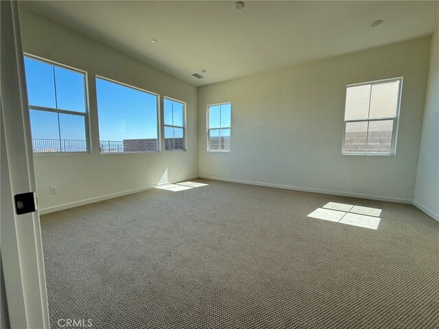 15949 Conservatory Dr, Fontana, CA 92336 - carpeted spare room with baseboards