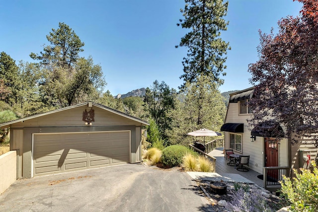 garage featuring a mountain view