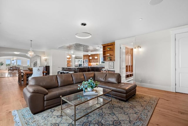 living room with light hardwood / wood-style flooring