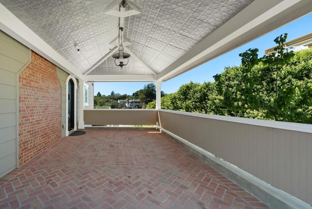 view of patio featuring ceiling fan