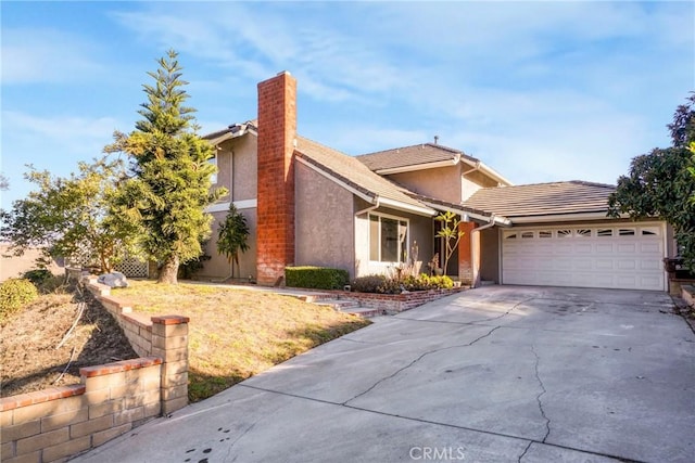 front of property with a garage