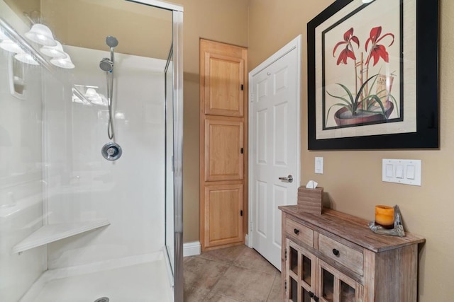 bathroom featuring tile patterned floors and walk in shower