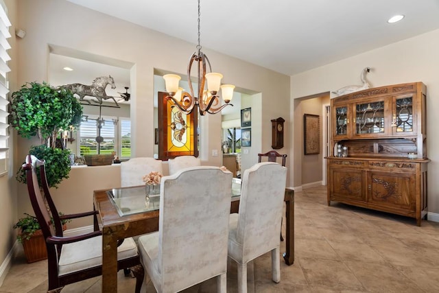 dining room featuring a notable chandelier