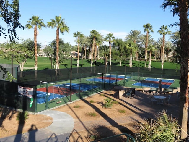 view of community with tennis court