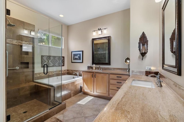 bathroom with separate shower and tub, tile patterned floors, and vanity