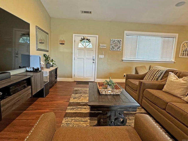 living room with dark wood-type flooring