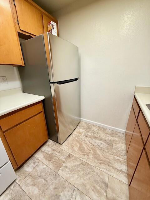 kitchen with stainless steel refrigerator