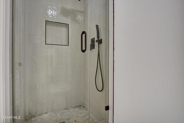 bathroom featuring walk in shower