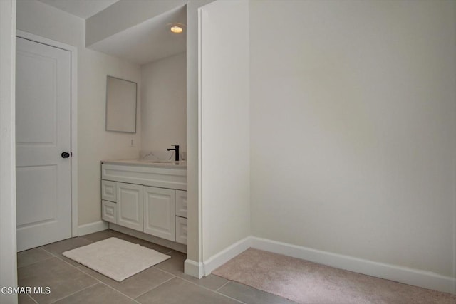 bathroom featuring vanity and tile patterned floors