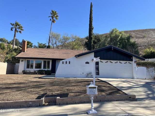 single story home with a garage