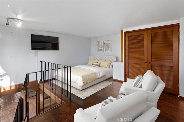 bedroom featuring wood-type flooring