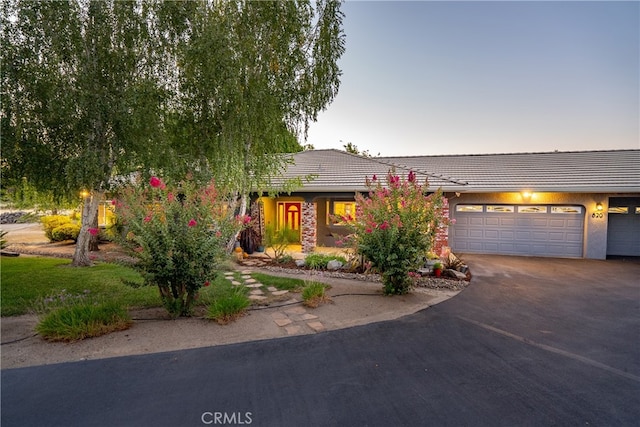 view of front of home with a garage